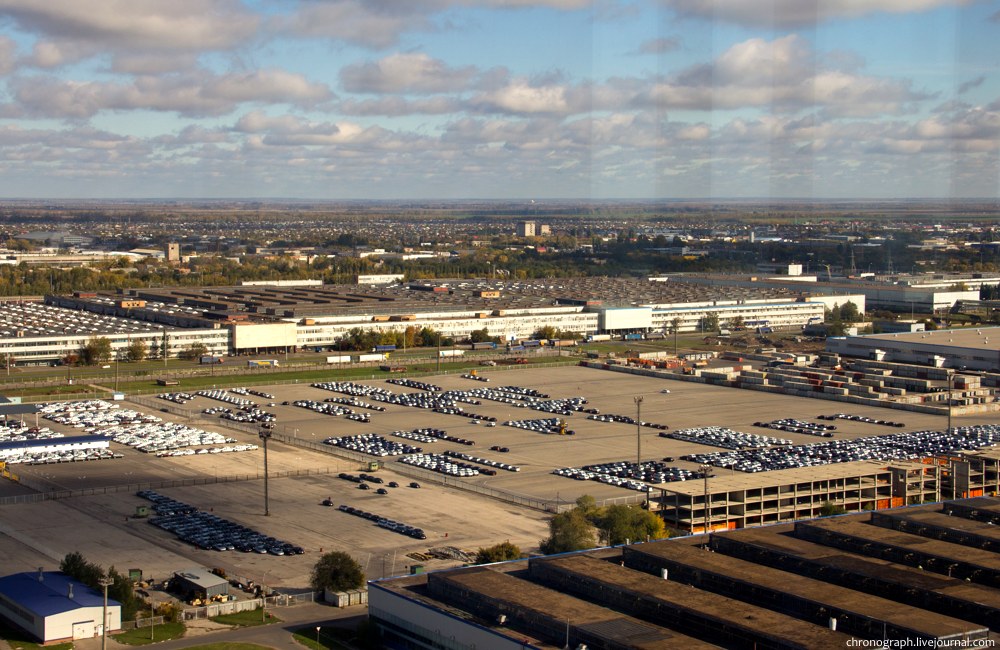 The area for cars for sale is half-filled.