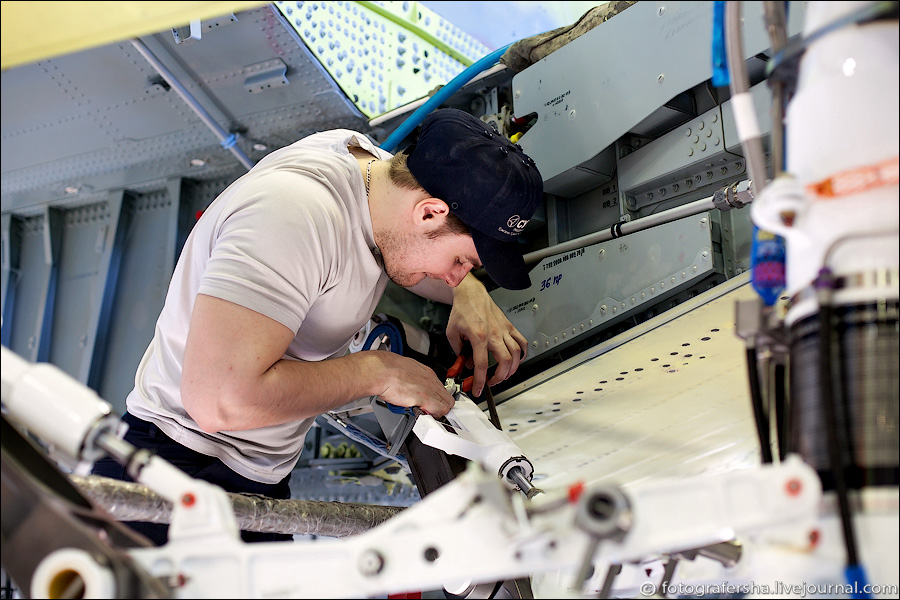 Roman assembles landing gears and likes to lift weights.